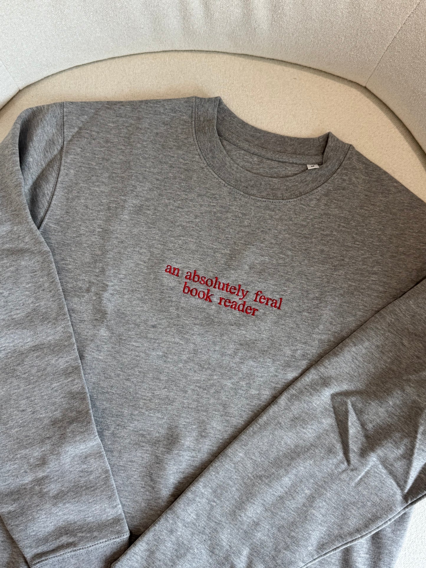 An Absolutely Feral Book Reader Embroideried Sweatshirt (Pre-made Clearance)
