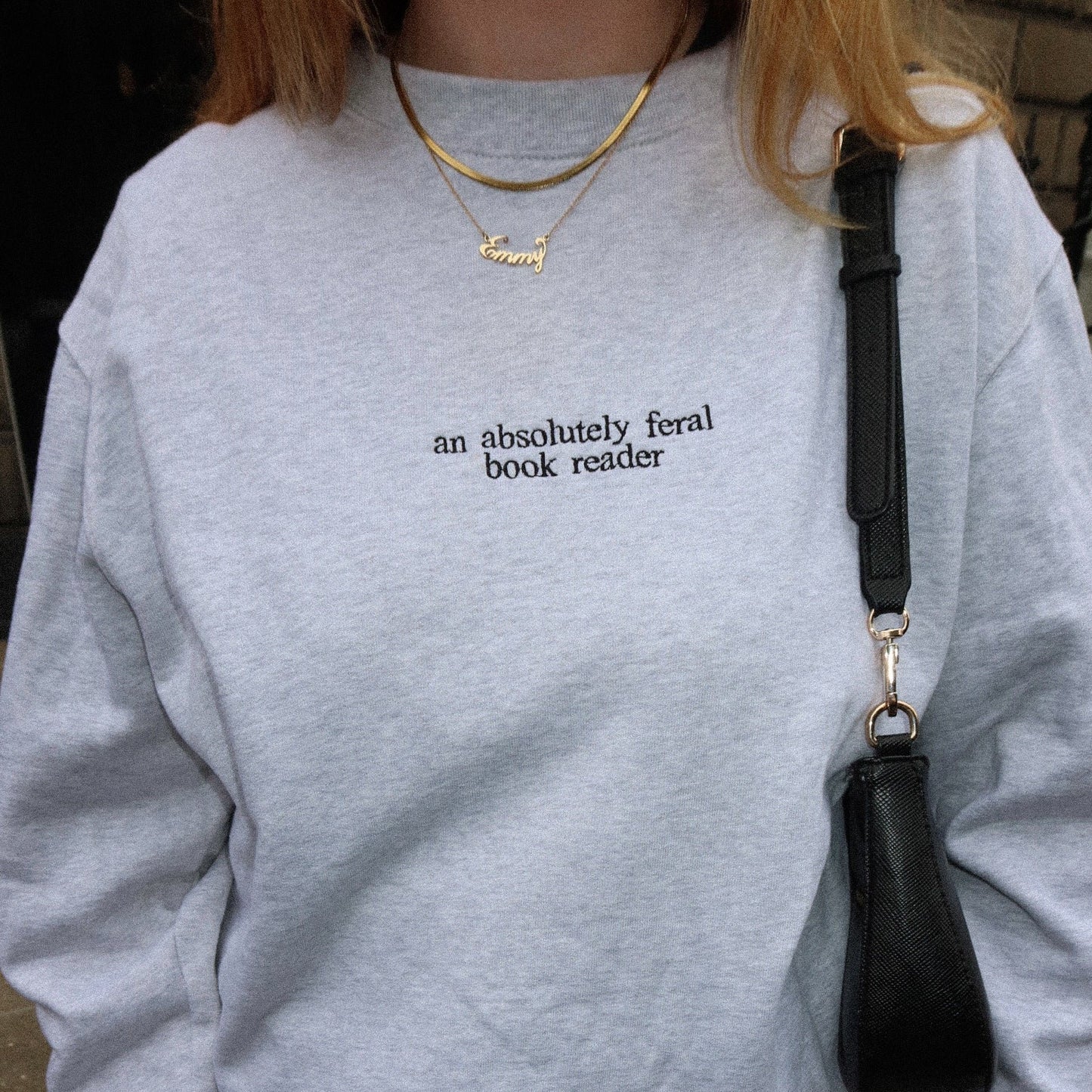 An Absolutely Feral Book Reader Embroidered Sweatshirt