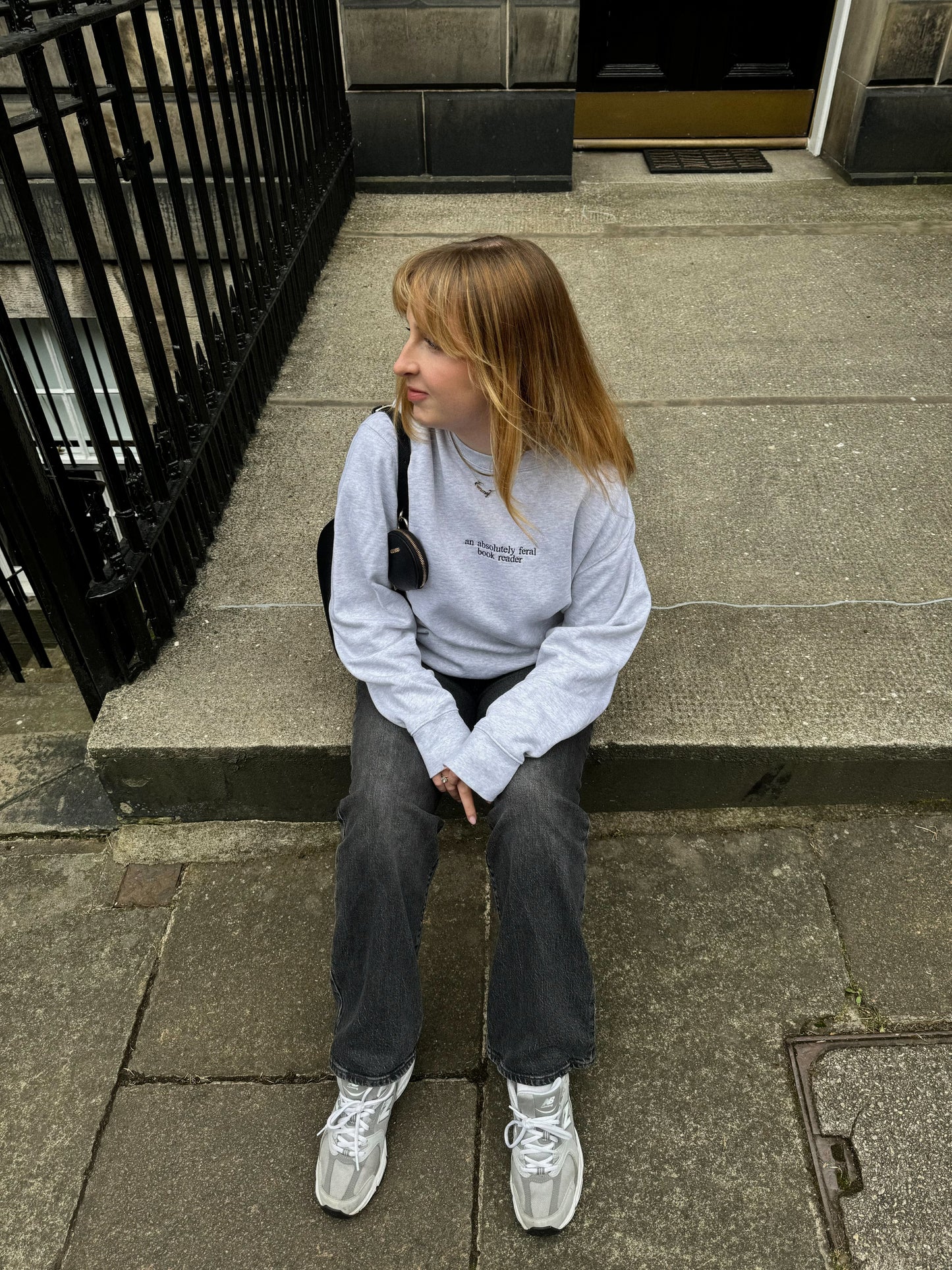 An Absolutely Feral Book Reader Embroidered Sweatshirt